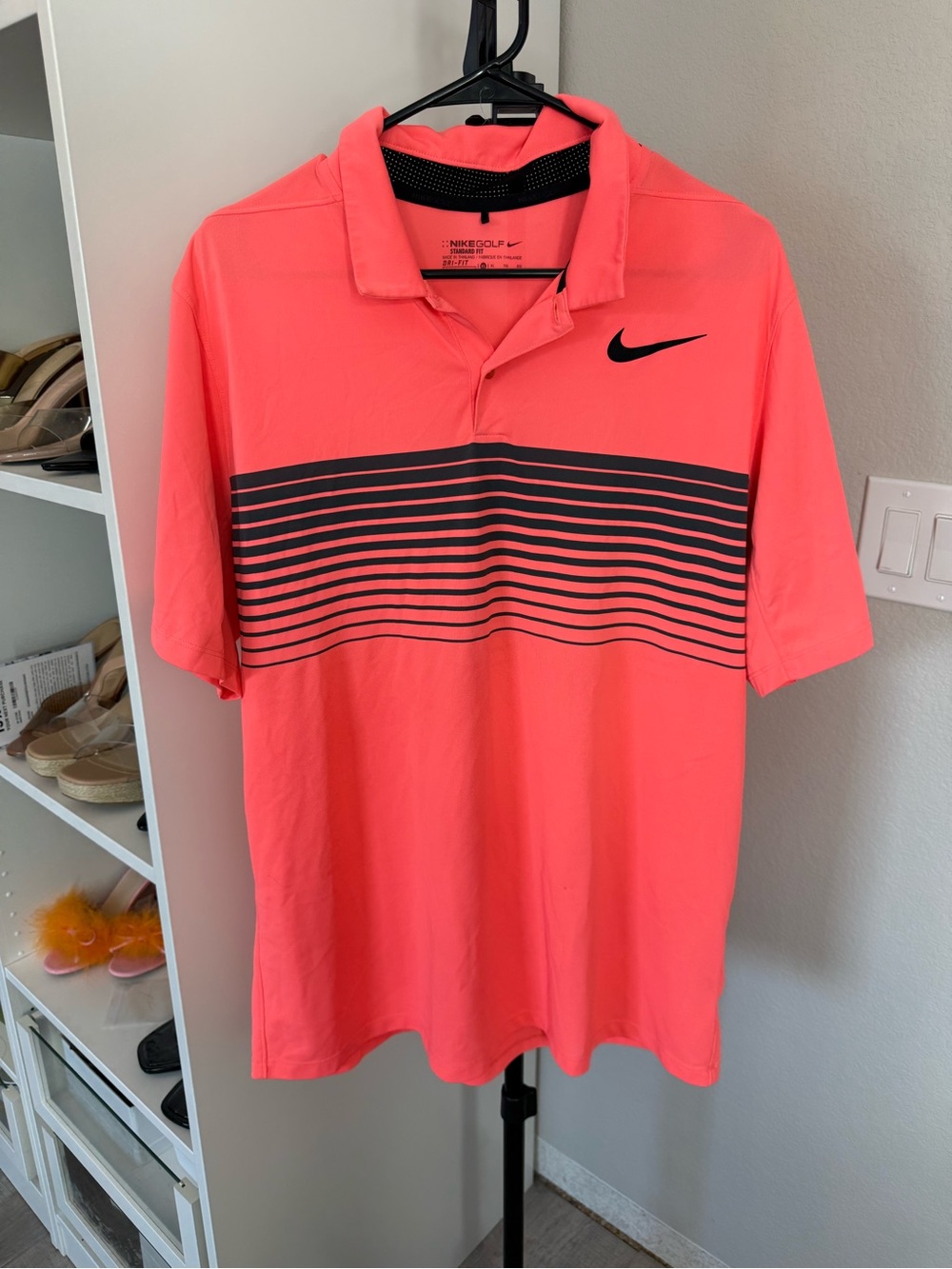 Nike Men’s Coral Polo with Black Stripe Detail